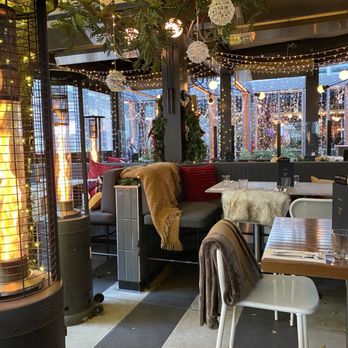 Earls Kitchen + Bar - Interior alfresco dining. - Canadian (New) Near Me - Toronto, Ontario