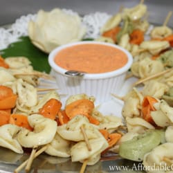 Passed hors d'oeuvres at this shabby chic wedding at Marie Selby Gardens in Sarasota, FL by Affordable Catering
