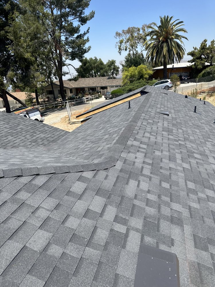 Slide of Meza's Roofing