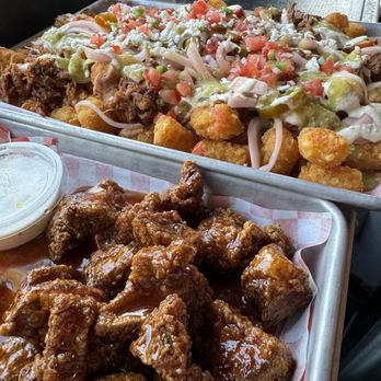 The Boardroom - House Totchos w/ carnitas & honey garlic boneless wings - Sports Bars Near Me - San Francisco, California The Boardroom - House Totchos w/ carnitas & honey garlic boneless wings - Sports Bars Near Me - San Francisco, California