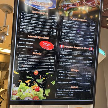 Chicho’s Subs - The brightly lit menu. The closer you get to it, the more you're amazed by its content. - Sandwiches Near Me - Roanoke, Virginia
