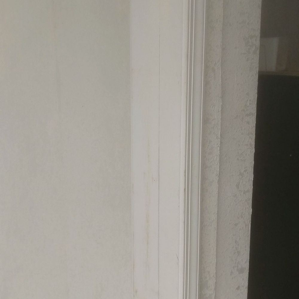 Cracked paint, dirty walls and floors