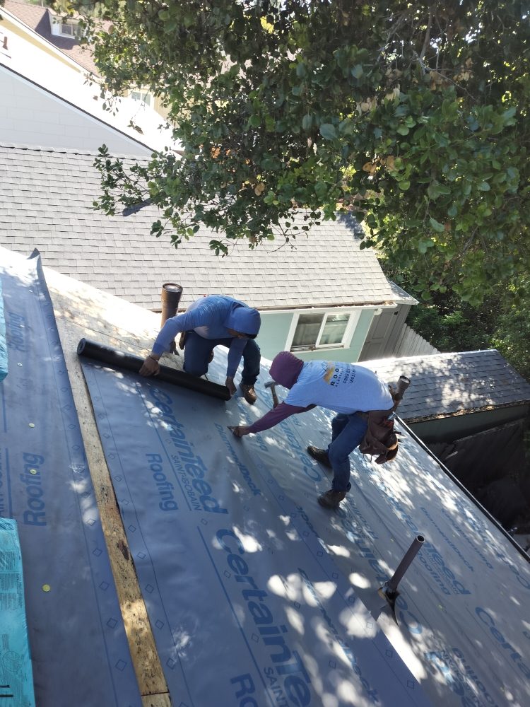 Slide of Pacific Roofing