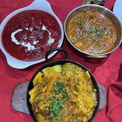 Mehfil's - Chicken tikka masala (top left) Chicken vindaloo (top right) Vegetable Karahi