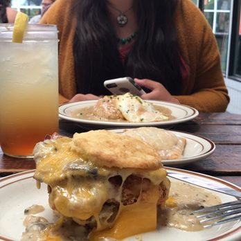 Pine State Biscuits - The Reggie Deluxe and Money Ball in the background. With an Arnold Palmer :) - Breakfast & Brunch Near Me - Portland, Oregon