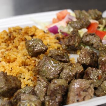 Tito's Latin Kitchen - a plate of meat and rice - Puerto Rican Near Me - Tampa, Florida Tito's Latin Kitchen - a plate of meat and rice - Puerto Rican Near Me - Tampa, Florida
