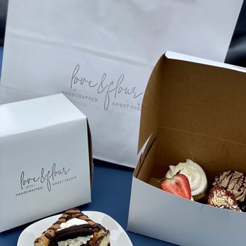 Love + Flour Bakery - a plate of cake and a box of cupcakes - Bakeries Near Me - Salem, New Hampshire Love + Flour Bakery - a plate of cake and a box of cupcakes - Bakeries Near Me - Salem, New Hampshire