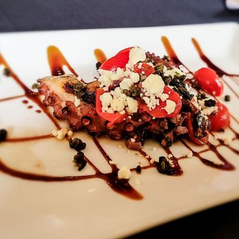 Vic's On the River - Grilled octopus with tomatoes,feta, blue cheese, olive oil and balsamic syrup, $15 (6/2024) - Seafood Near Me - Savannah, Georgia Vic's On the River - Grilled octopus with tomatoes,feta, blue cheese, olive oil and balsamic syrup, $15 (6/2024) - Seafood Near Me - Savannah, Georgia
