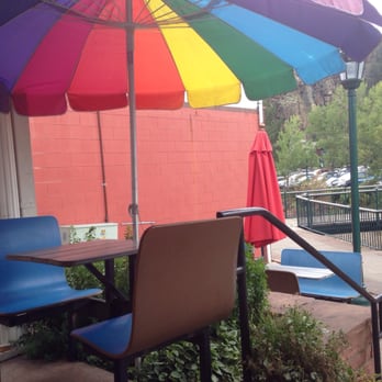 Munchin House - Groovy secret patio seating on the river in back!! Sssssh! Its a secret!!! - Ice Cream & Frozen Yogurt Near Me - Estes Park, Colorado Munchin House - Groovy secret patio seating on the river in back!! Sssssh! Its a secret!!! - Ice Cream & Frozen Yogurt Near Me - Estes Park, Colorado