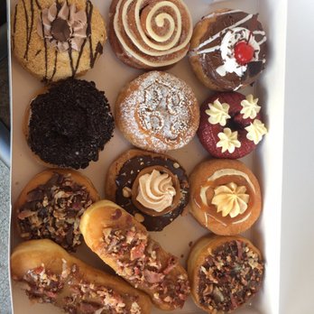 Mojo Donuts - 4 bacon donuts (2 logs, 2 Mac bacon with Nutella), salted cheesecake, truffle donut, Oreo, sundae, red velvet Abuelita (arroz con leche) - Donuts Near Me - Pembroke Pines, Florida Mojo Donuts - 4 bacon donuts (2 logs, 2 Mac bacon with Nutella), salted cheesecake, truffle donut, Oreo, sundae, red velvet Abuelita (arroz con leche) - Donuts Near Me - Pembroke Pines, Florida