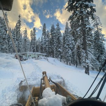 West End Snow Clearing - Construction site loader plowing with an amazing back drop - Snow Removal Near Me - Truckee, California