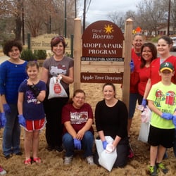 AppleTree Day School - San Antonio - AppleTree Day School of Boerne. phot of staff and friends clean up the River Road Park in Boerne.