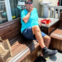 CB Perkins - Outside of CB Perkins Cigar Bar & Lounge enjoying a cigar and a beer