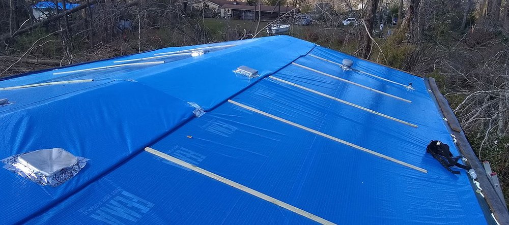 Slide of A&E Construction & Roofing Group