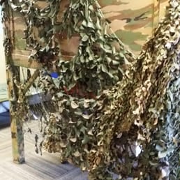 One camouflage dress up play area.