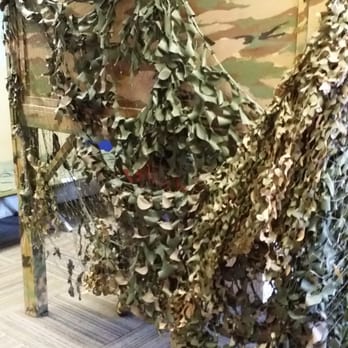 Fascinate-U Children's Museum - One camouflage dress up play area. - Children's Museums Near Me - Fayetteville, North Carolina