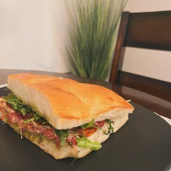 Mambo Italiano - #5, the Gandolfini panino with sweet capicolla, bresaola, sharp provolone, sun-dried peppers, baby arugula, and basil pesto spread. - Italian Near Me - Colts Neck, New Jersey Mambo Italiano - #5, the Gandolfini panino with sweet capicolla, bresaola, sharp provolone, sun-dried peppers, baby arugula, and basil pesto spread. - Italian Near Me - Colts Neck, New Jersey