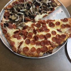 Gatehouse Pizza - Half pepperoni and half supreme pizza.