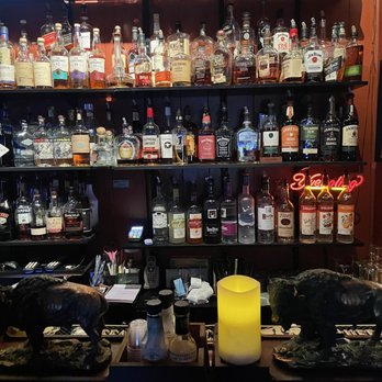 Havana Moe's Cigars - bottles of liquor on shelves - Cigar Bars Near Me - Rochester, New York