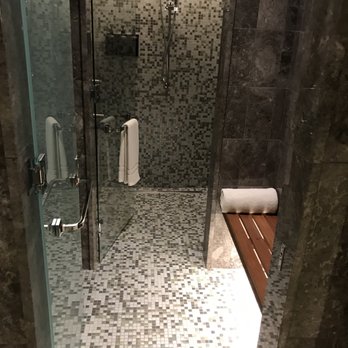 The Langham, Chicago - Chuan Spa - Men's Locker Room shower with changing area - February 2018 - Hotels Near Me - Chicago, Illinois The Langham, Chicago - Chuan Spa - Men's Locker Room shower with changing area - February 2018 - Hotels Near Me - Chicago, Illinois
