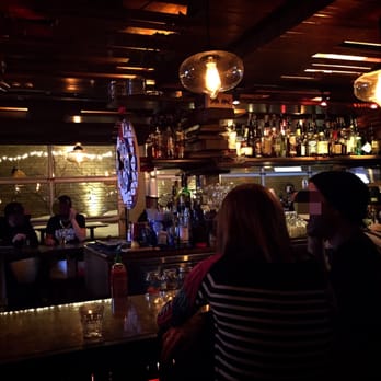 Grenade - a bar with people sitting at the bar - Bars Near Me - Montreal, Quebec Grenade - a bar with people sitting at the bar - Bars Near Me - Montreal, Quebec