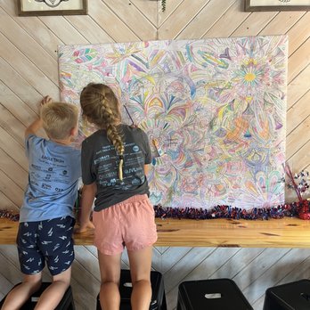 Driftwood Deli - Cute wall space where the kids colored while we finished our food. - Delis Near Me - Munising, Michigan