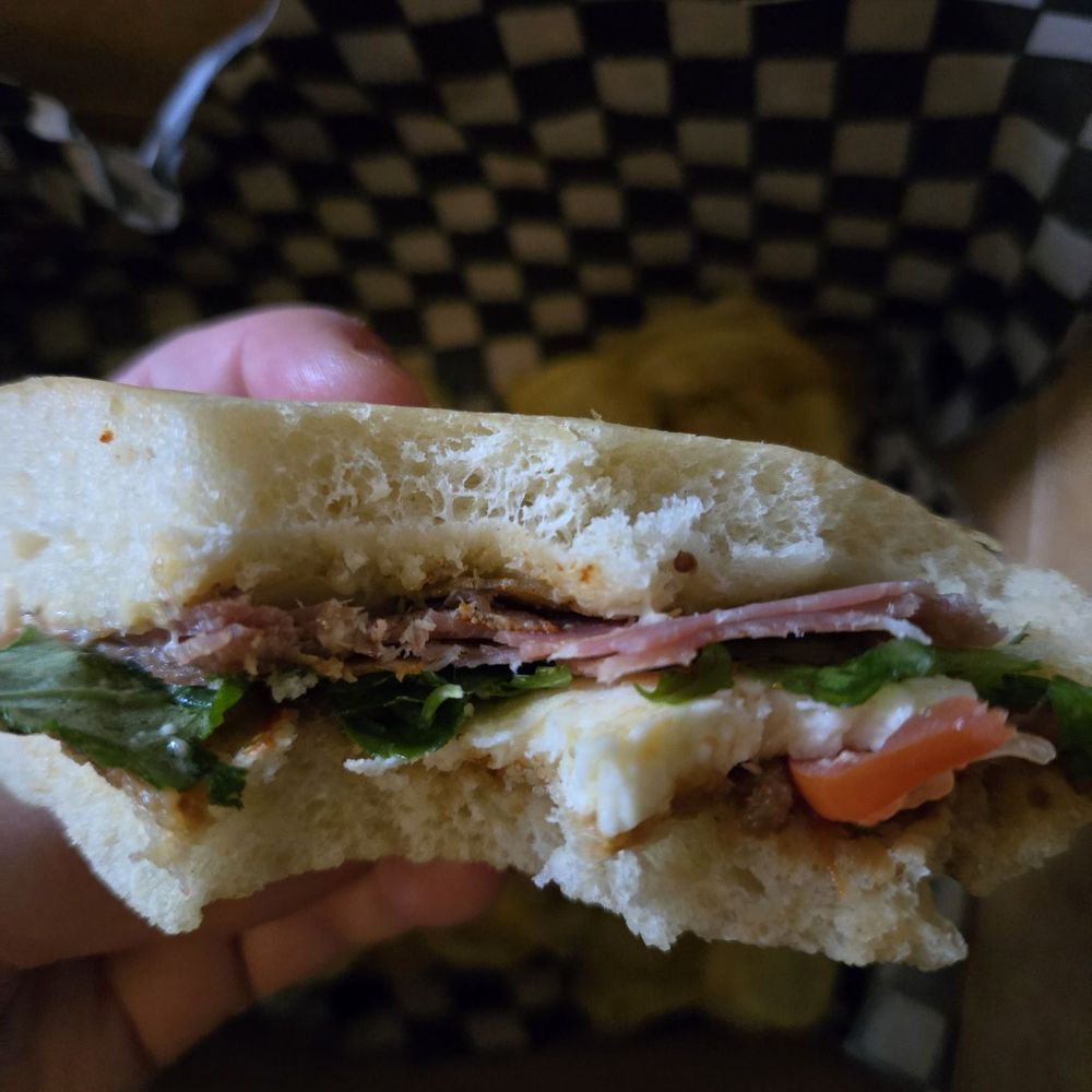 Barely anything instead the "panino" . This place a hoax or what? This is not grilled...they don't even know what panini are.