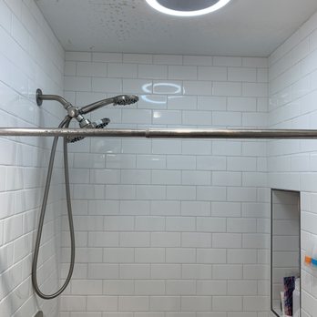 Real Vida Remodeling - Shower door to go here instead of the shower curtain. after - General Contractors Near Me