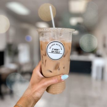 Orlando Nutrition - a hand holding a cup of iced coffee - Juice Bars & Smoothies Near Me - Lake Mary, Florida Orlando Nutrition - a hand holding a cup of iced coffee - Juice Bars & Smoothies Near Me - Lake Mary, Florida