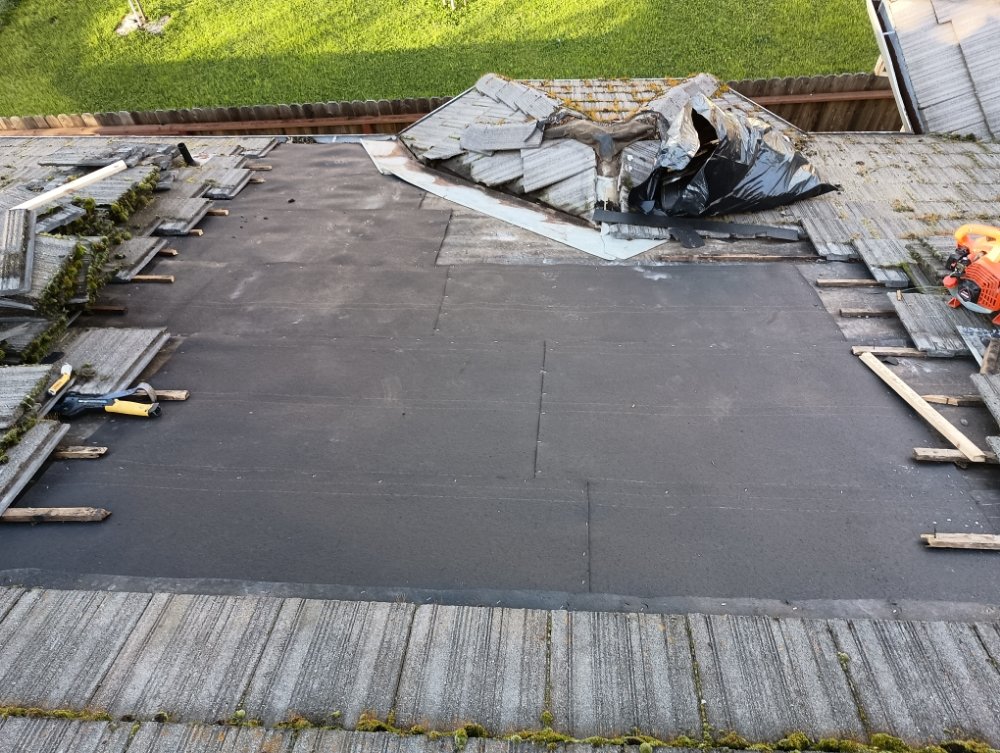 Slide of Momentum Roofing