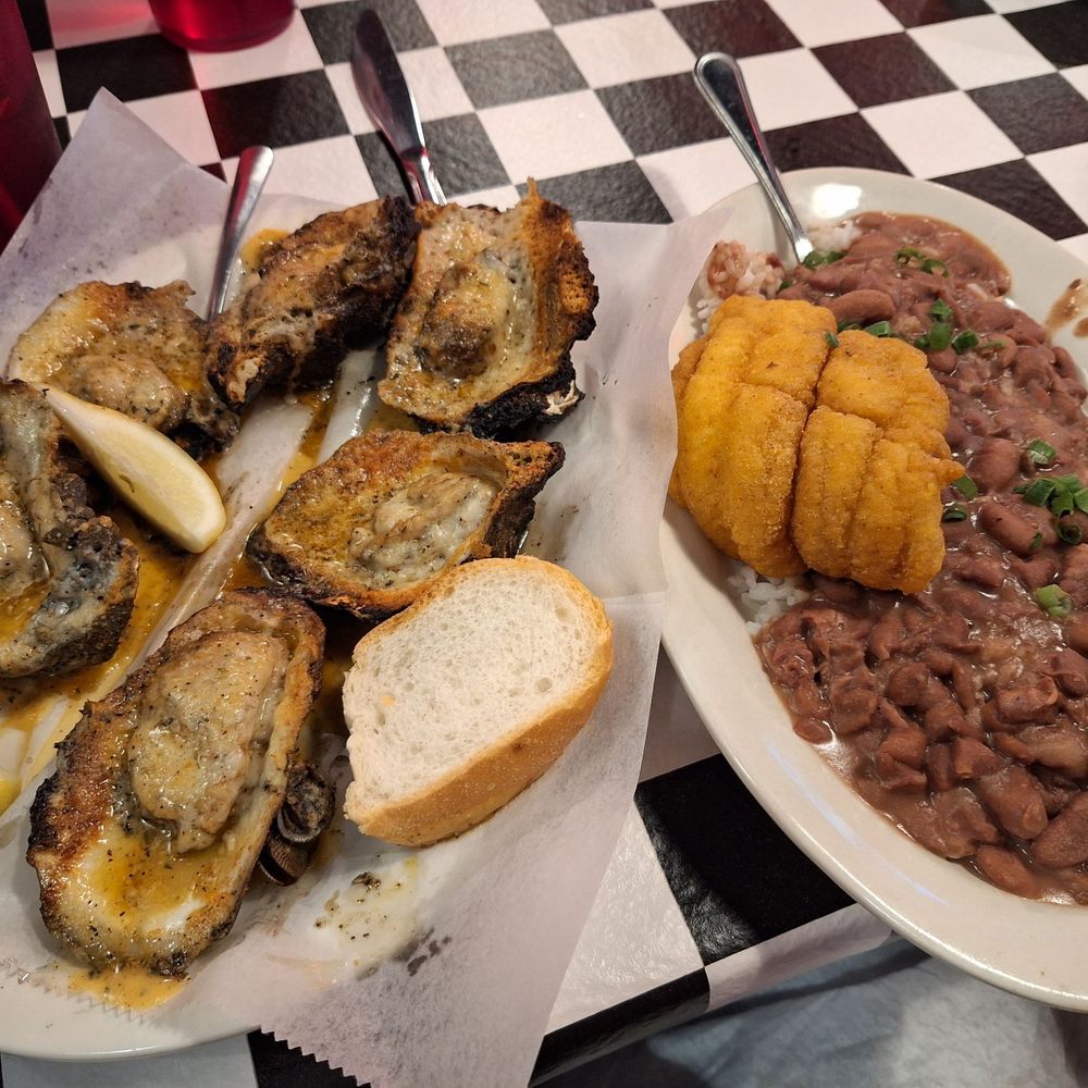 Acme Oyster House - 1/2 dozen chargrilled oysters, red beans and rice with fish (tilapia) - Seafood Near Me - Metairie, Louisiana Acme Oyster House - 1/2 dozen chargrilled oysters, red beans and rice with fish (tilapia) - Seafood Near Me - Metairie, Louisiana
