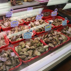 Lapointe Fish Limited - Fresh oysters ranging from $1.70 to $2.50 per oyster. They will even shuck them for you for free.