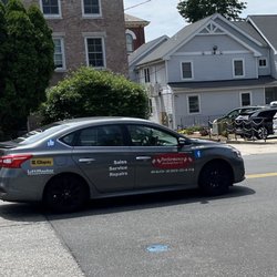 Performance Overhead Door - Car that flew past me, ironically waiting for the flagger who was right around the corner.