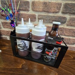 Iron Born Bistro - BBQ sauce choices found on tables