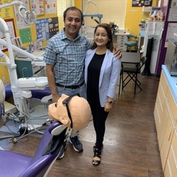 Hands On Dental Assistant Training - Husband proud of his wife for successful completing her classes.