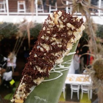 Popbar - Pistachio Bar with white chocolate dip and drizzle, chocolate sprinkles, and almonds - Desserts Near Me - Anaheim, California Popbar - Pistachio Bar with white chocolate dip and drizzle, chocolate sprinkles, and almonds - Desserts Near Me - Anaheim, California