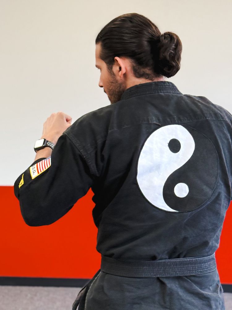 United Studios of Self Defense Logo