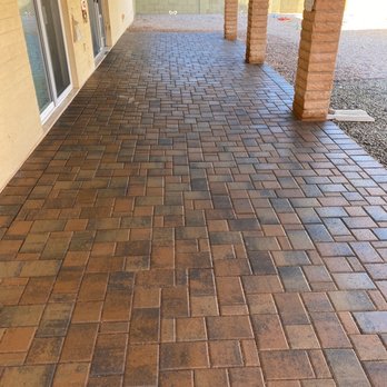 AZ Dreamscapes - a patio with brick pavers - General Contractors Near Me