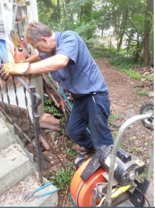 Slide of Local Guy Plumbing Drain service