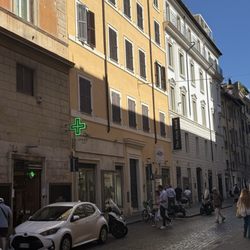 Farmacia in Lucina - Side angle store front. Off Via dei Due Macelli, 99 Cap 00187 ROMA.