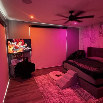 Level Up Construction Services - My master bedroom-with my custom installed lighting, I can do over 200 different color combinations - General Contractors Near Me