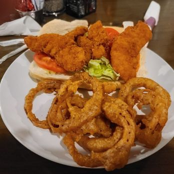 Big Four Cafe - Fried Po Boy Sandwich with onion rings. Epic stuff. - Cafes Near Me - Batesville, Indiana