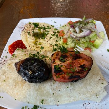 Al Basha - Iraqi Kabob with charred onion, grilled tomato, homestyle hummus and great dressing - Mediterranean Near Me - Seattle, Washington Al Basha - Iraqi Kabob with charred onion, grilled tomato, homestyle hummus and great dressing - Mediterranean Near Me - Seattle, Washington