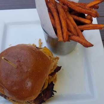 Hennessey's Grill - Brisket sandwich and sweet potato fries @ Hennessey's Tavern - Juice Bars & Smoothies Near Me - Seal Beach, California Hennessey's Grill - Brisket sandwich and sweet potato fries @ Hennessey's Tavern - Juice Bars & Smoothies Near Me - Seal Beach, California