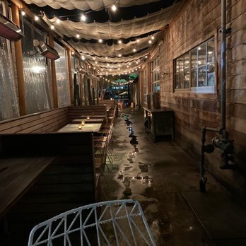 Campfire - Outdoor space on a rainy, cold evening - New American Near Me - Carlsbad, California Campfire - Outdoor space on a rainy, cold evening - New American Near Me - Carlsbad, California