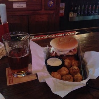 JJ's Grill - Grilled chicken sandwich, with bacon, lettuce, onions, and tomato on top and paired with fried mushrooms. - American Near Me - Rogers, Arkansas