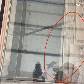 Moving Across America - Broken glass from not taking glass out of cabinet before moving it - Packing Services Near Me Moving Across America - Broken glass from not taking glass out of cabinet before moving it - Packing Services Near Me