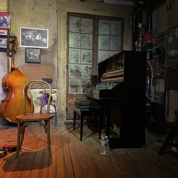 Preservation Hall - Some of the instruments before we put our phones away. - Music Venues Near Me - New Orleans, Louisiana Preservation Hall - Some of the instruments before we put our phones away. - Music Venues Near Me - New Orleans, Louisiana