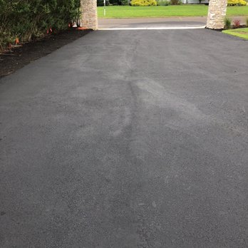 United Paving Contractors - A line of uneven pavement right down the middle of driveway, owner says this is a "cosmetic issue," so they will not fix. - Masonry/Concrete Near Me - Deptford, New Jersey United Paving Contractors - A line of uneven pavement right down the middle of driveway, owner says this is a "cosmetic issue," so they will not fix. - Masonry/Concrete Near Me - Deptford, New Jersey