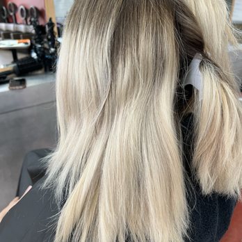 Salon Success Academy - Before Picture. Blending in her Roots with some Lowlights. - Cosmetology Schools Near Me - Corona, California